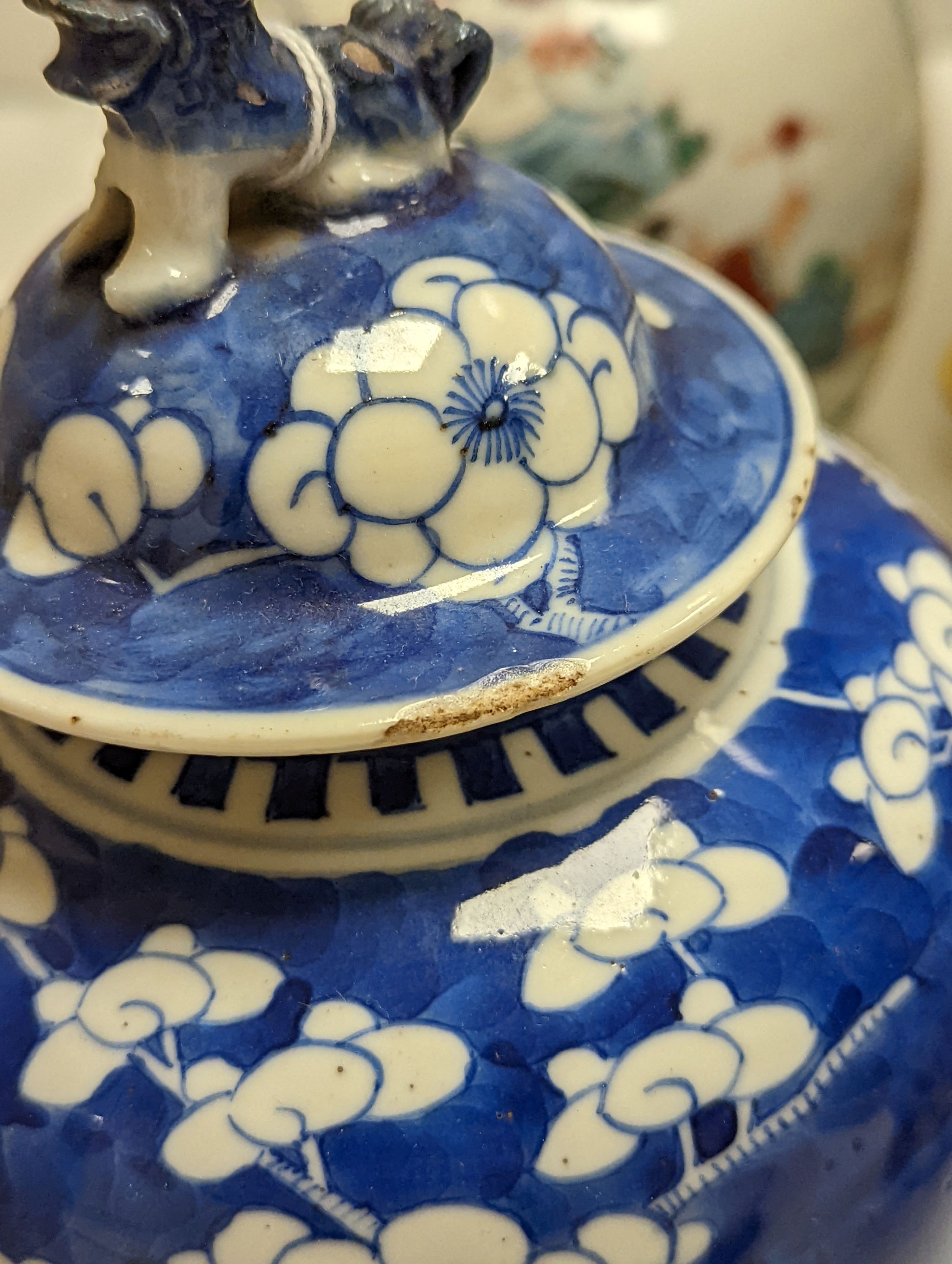 A Chinese famille rose ginger jar, a 19th century Chinese blue and white porcelain jar and cover, a blue and white cylinder vase, a small Chinese dish and orange glass vase (5)